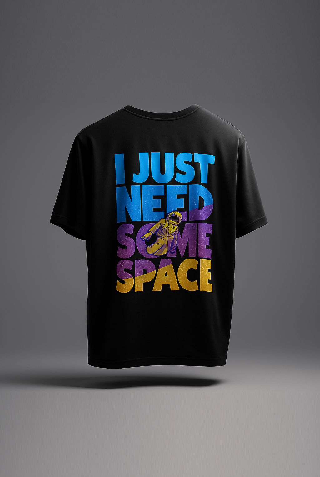 Black t-shirt with colorful text 'I JUST NEED SOME SPACE'