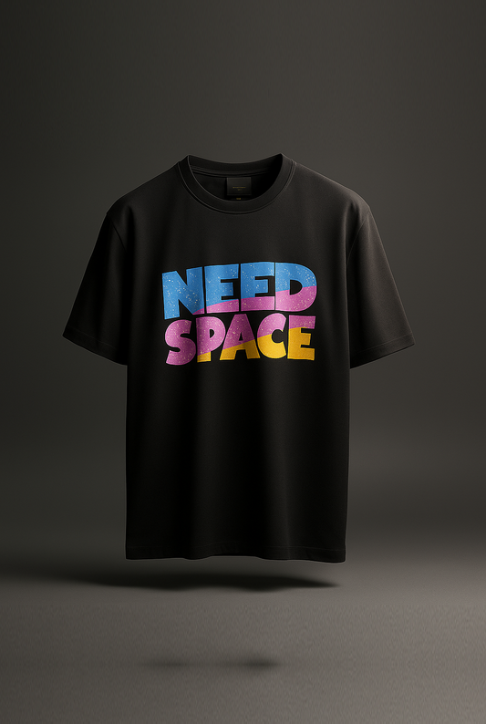 Black t-shirt with 'NEED SPACE' text in colorful letters