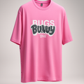 Pink t-shirt with 'Bugs Bunny' text on a gray background
