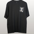 Black t-shirt with a small graphic on the chest against a light gray background