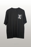 Black t-shirt with a small graphic on the chest against a light gray background