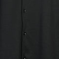 Fabure Close-up of a black textured shirt
