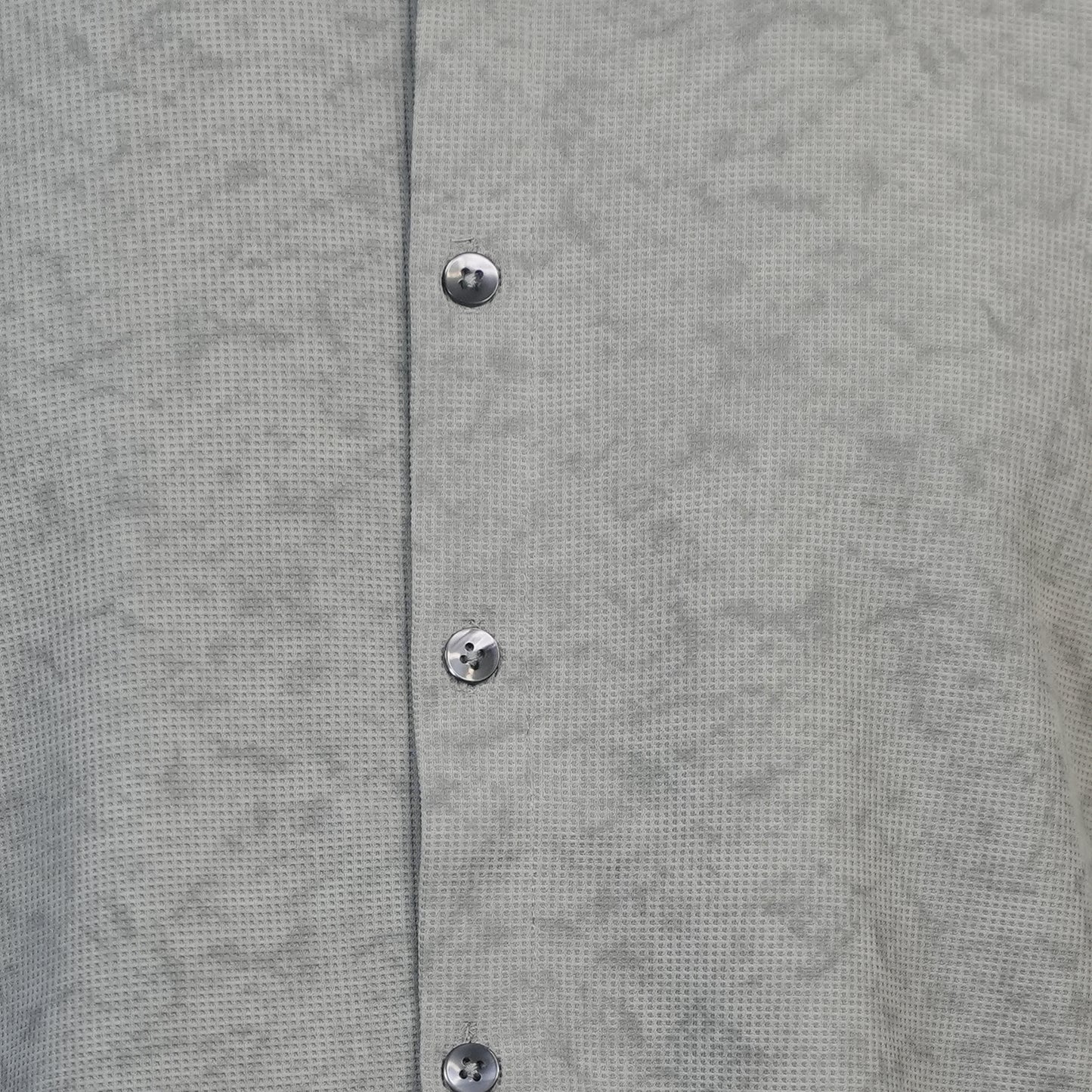 Fabure Close-up of a gray textured shirt