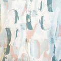 Close-up of a patterned shirt with abstract design